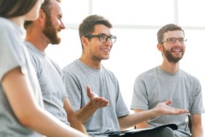 man talking to group of men in a men's rehab program in massachusetts