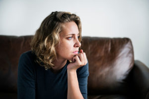 woman looking afar wondering what is a functioning alcoholic